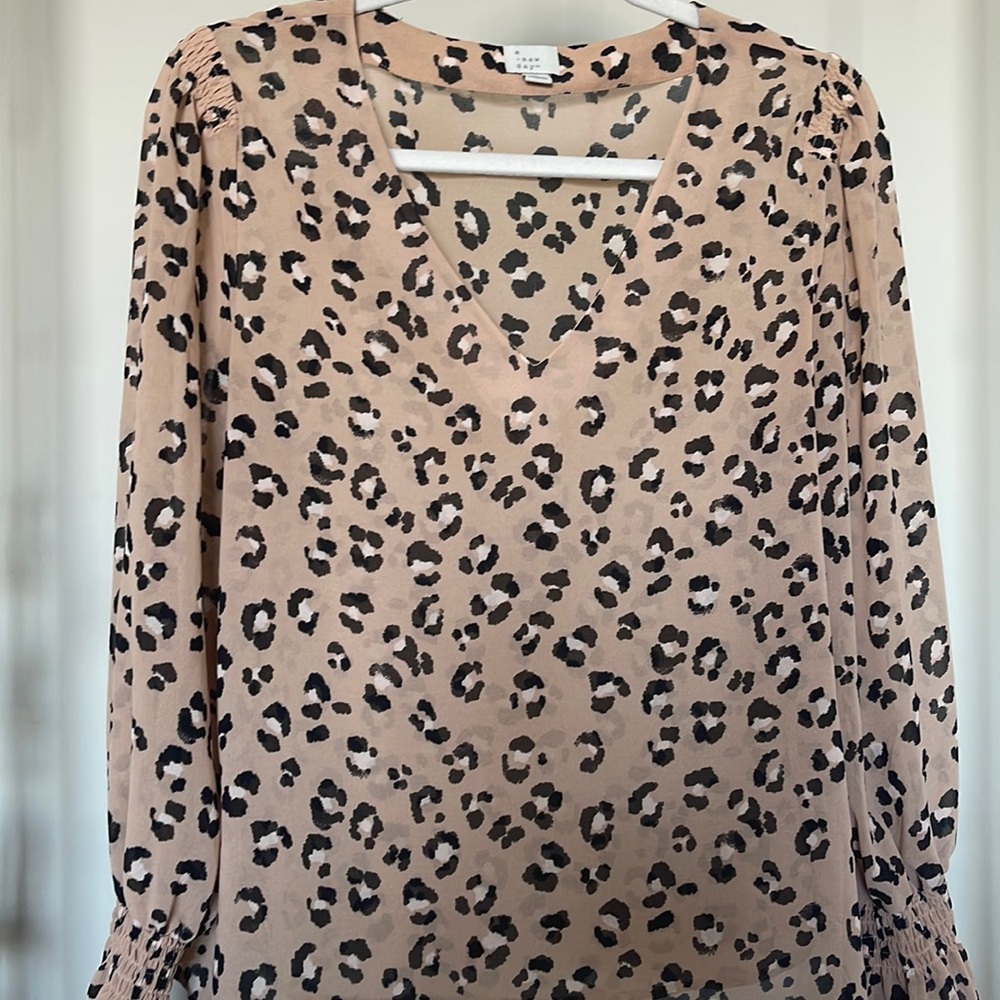 A New Day Cheetah print V neck blouse with smocked sleeve
